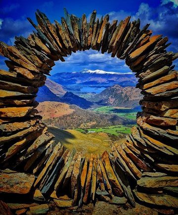 Art piece crafted from slate, overlooking Borrowdale Valley, England.