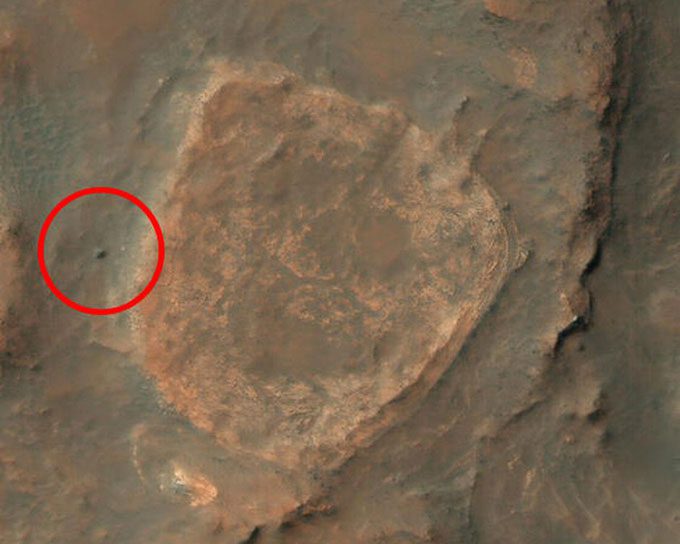NASA's Spirit rover lies motionless on Mars.