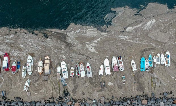 Local boats submerged in the strange "slime"