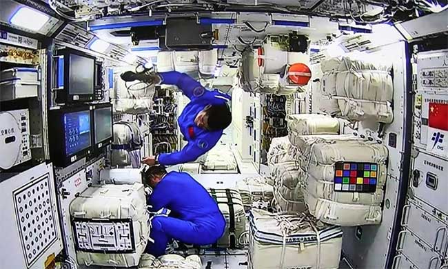 Chinese astronauts enter the Tianhe space station.