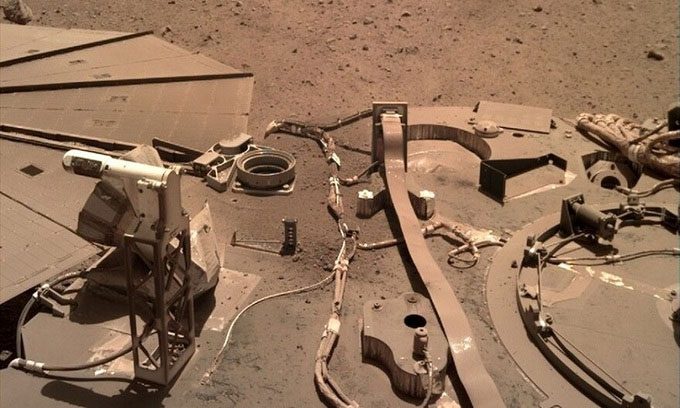 Martian dust covers the solar panel surface of the Mars InSight lander.