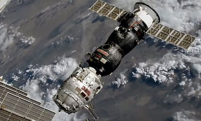 Pirs module attached to the Progress MS-16/77P spacecraft detaching from the ISS, preparing for re-entry on July 26.