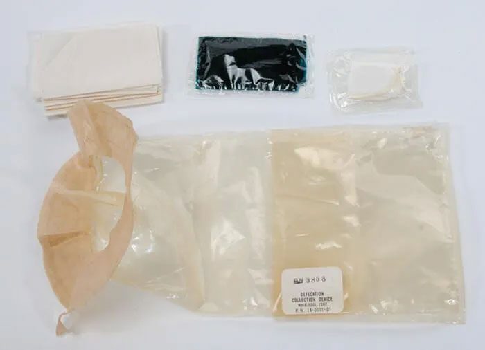 Solid waste support device on Apollo spacecraft.