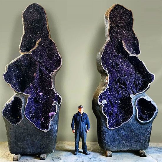 Giant amethyst geode displayed at a rock exhibition.