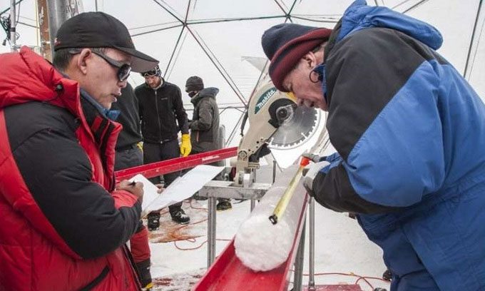 Researchers processing an ice core taken from the Guliya Glacier in 2015.
