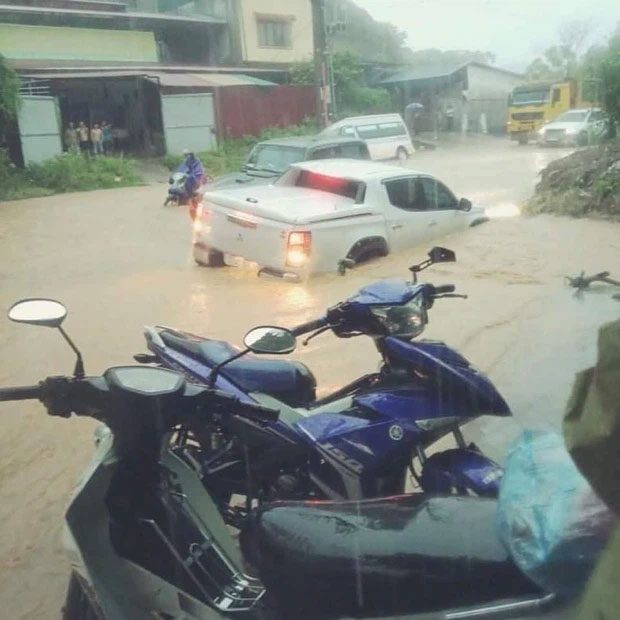 Many vehicles submerged in water