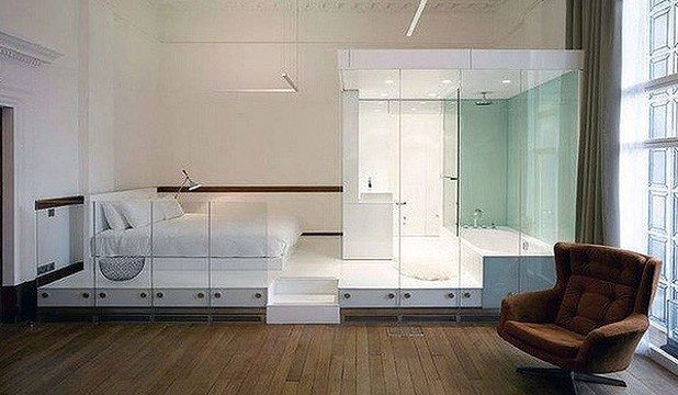 Building a bathroom with glass walls creates a more spacious and "floating" feel.