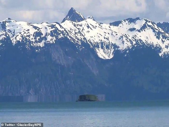 Optical illusion turns an island in Alaska into a "flying saucer"
