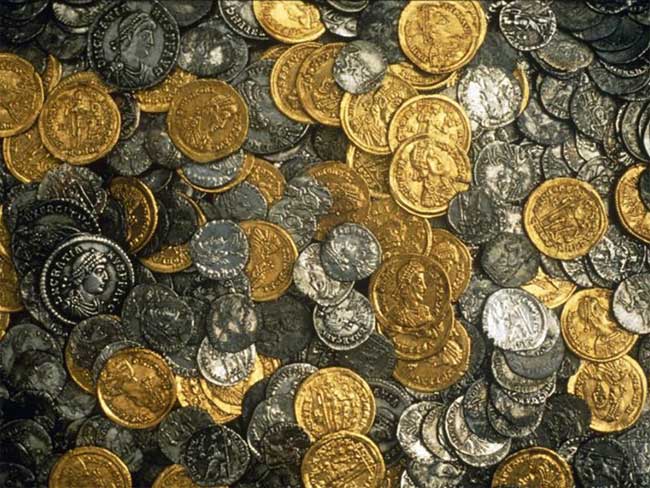 Eric Lawes discovered a treasure of nearly 15,000 Roman coins.