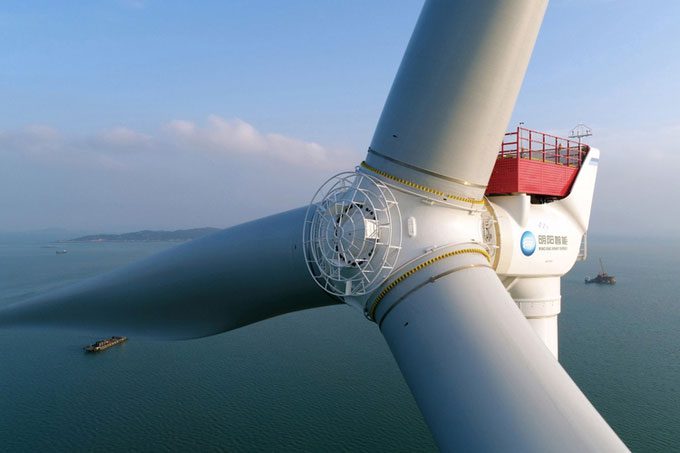 Large wind turbines provide greater production efficiency and economics.