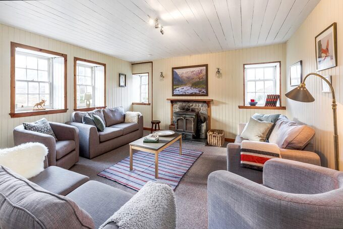 The house features a living room and dining area with an open space.