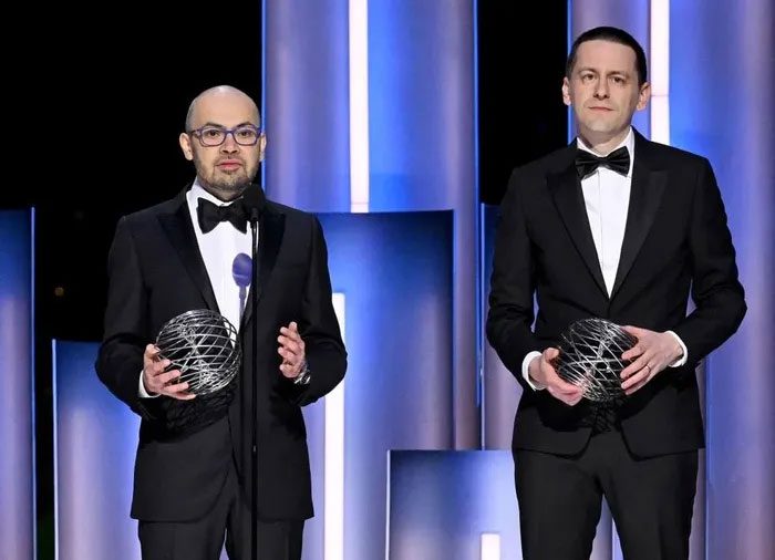 Demis Hassabis and John Jumper receiving an award at the Breakthrough ceremony