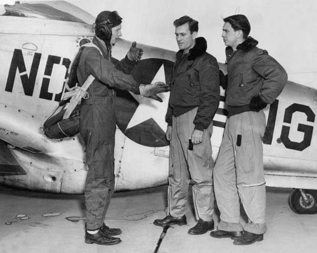 Gorman (left) with his P-51 from the 178th Fighter Squadron at Hector Airport.