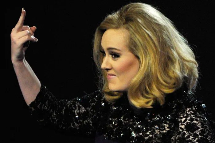 Adele gives the middle finger at the Brit Awards (Reuters)