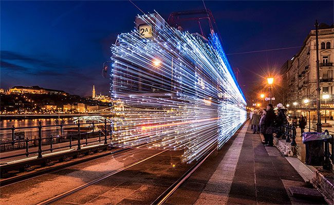 A train seemingly created from thousands of light rays.