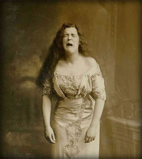 Portrait of a woman sneezing