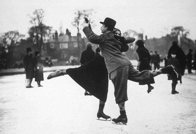 A couple dancing on ice skates at Whitestone Pond, Hampstead, London, 1933