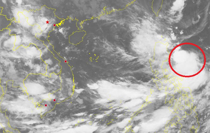 Tropical depression in the waters east of the Philippines