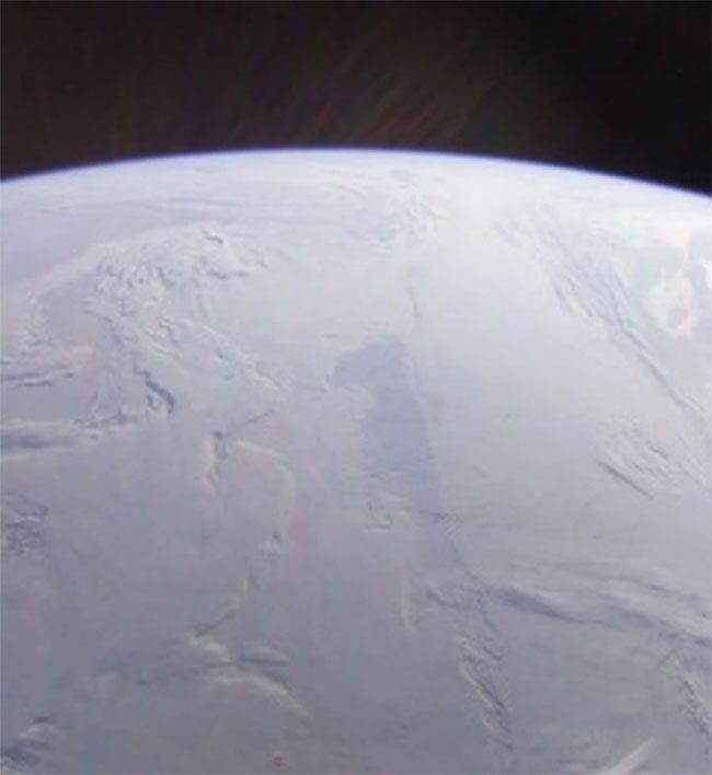 The North Pole as seen from the Endurance spacecraft. The streaks in the sky are due to lens flare.