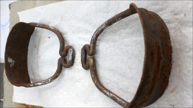 Two stirrups excavated from the remains of a Mongolian woman