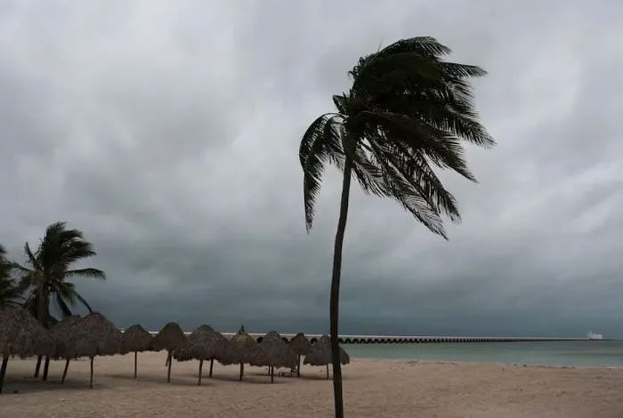 Strong winds and dark clouds from Hurricane Milton cover the sky over Progreso, Mexico