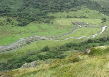 bending river bank helping flooding 136880