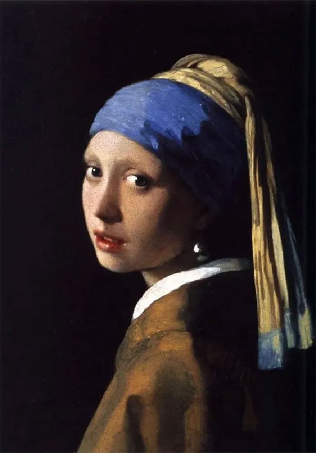 This is one of the rare paintings by Vermeer where the main character looks directly at the viewer.