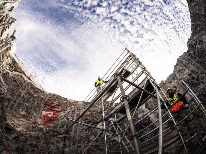 Technicians digging foundations for the GMT support structure back in 2019.