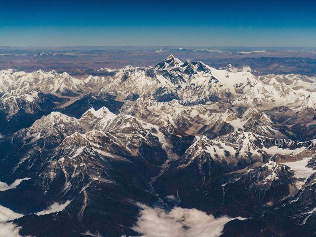 Beneath the mountains lie massive tunnels and hydropower turbines