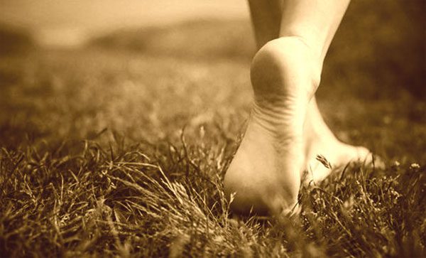 Why is walking barefoot good for health?