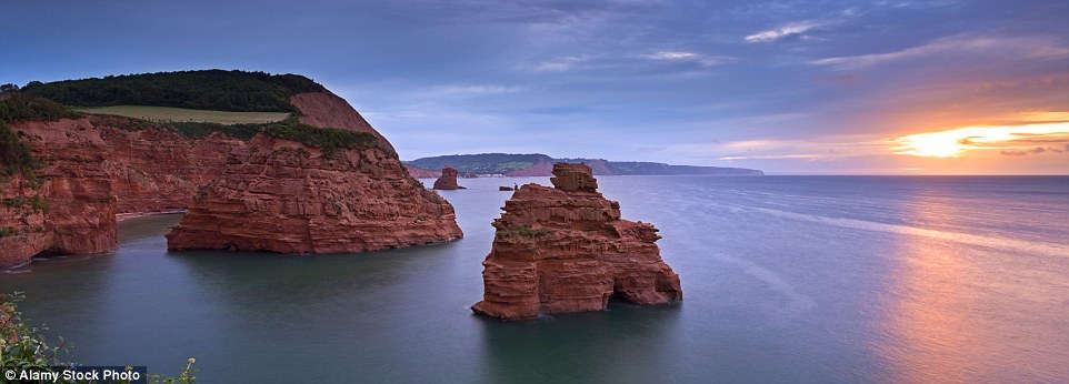 The unique red color of the rocks becomes even more vibrant at sunset in Ladram Bay on the Jurassic Coast, making many feel as if they are on Mars.