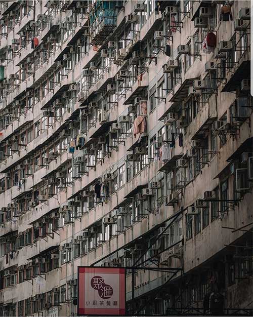 A building featuring typical air conditioning units in Hong Kong.