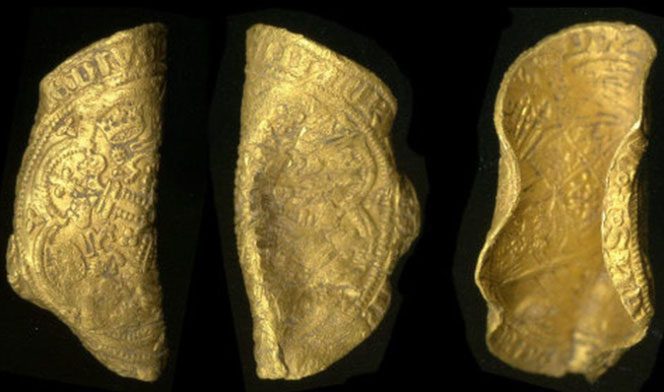 Gold noble coin photographed from various angles.