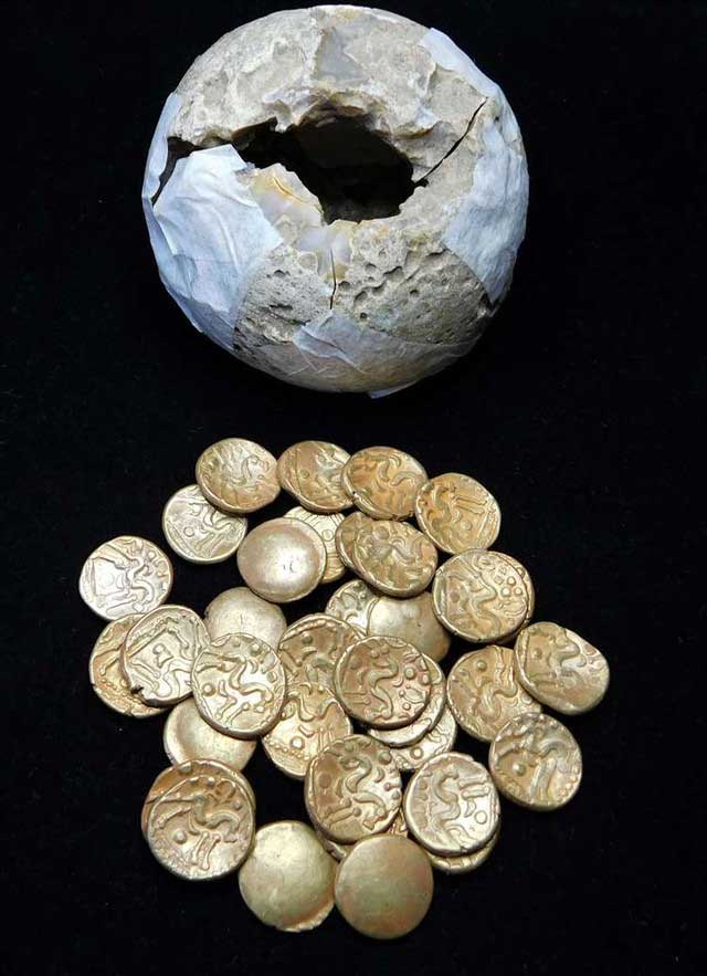 Roman coins hidden in a flint stone.