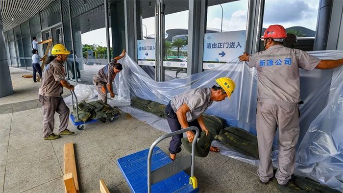 Workers preparing for Super Typhoon Yagi