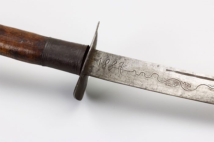 The blade is engraved with the number 1887, likely the year it was forged.