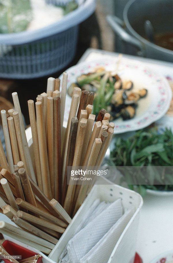 A sidewalk snail noodle shop.