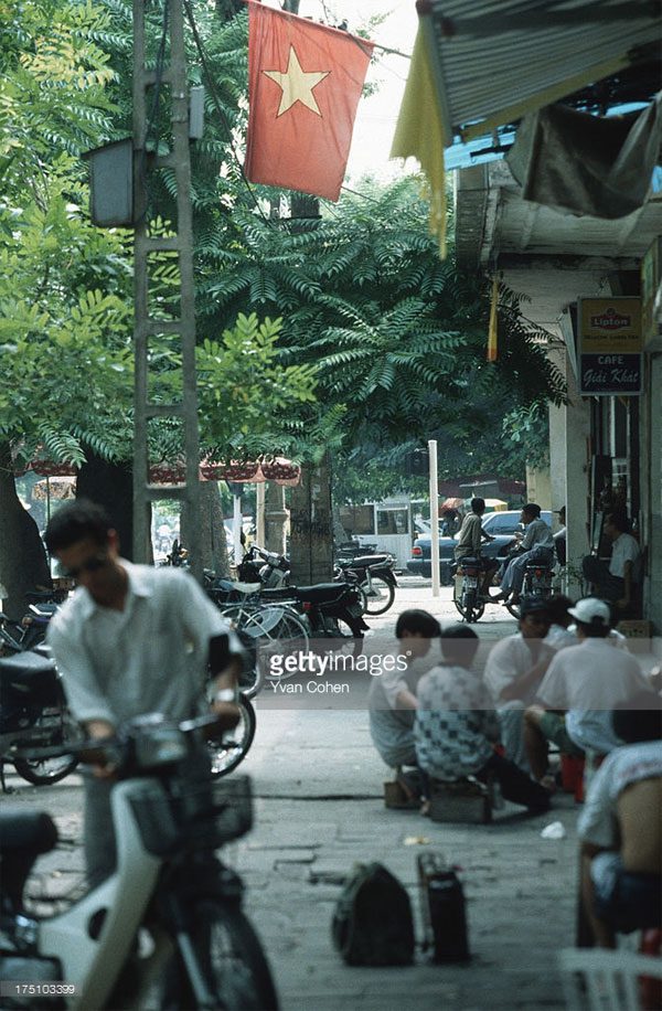 Sidewalks are bustling with various activities of the locals.