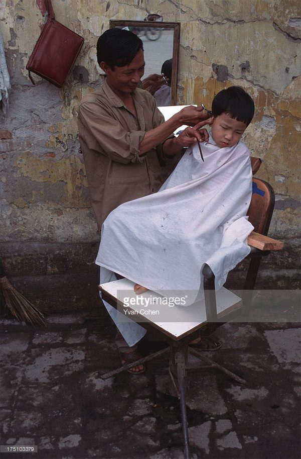 A sidewalk barber shop.