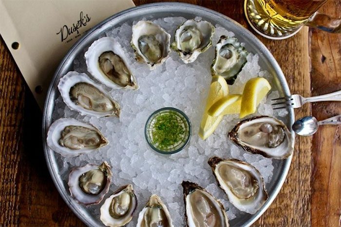 If dining at home, you can store oysters in the refrigerator until the party starts instead of displaying them on an ice tray.