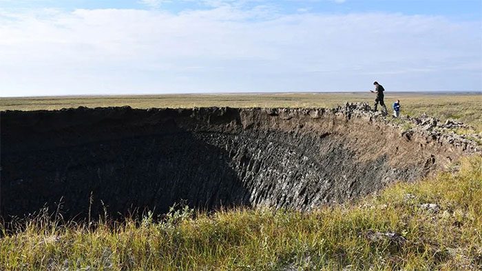 Scientists survey the giant sinkhole on the Yamal Peninsula