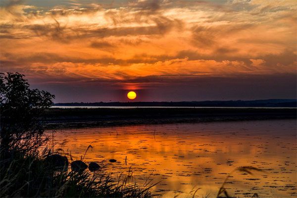 Why does the sky turn red at sunset?