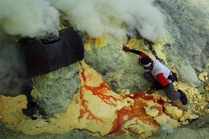 Miners extracting sulfur