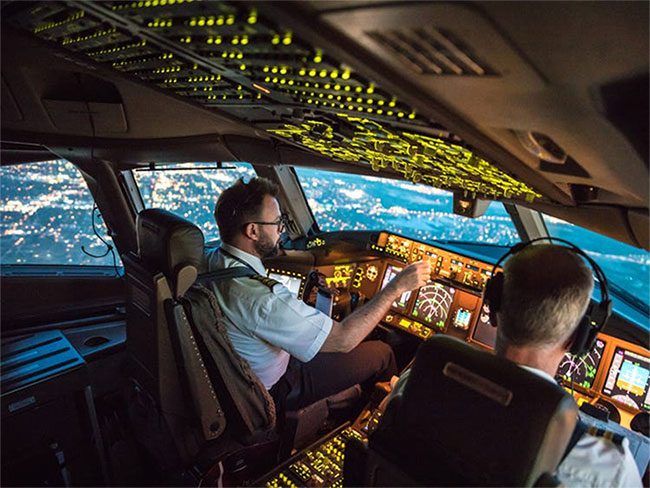 The night sky outside during the aircraft's landing.