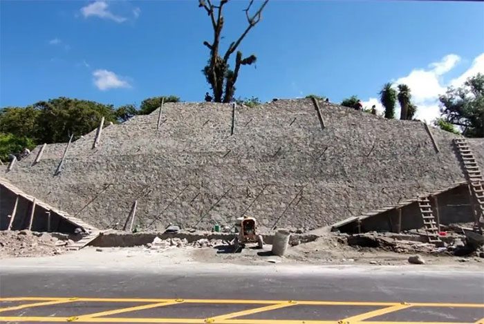 The mysterious pyramid stands right in the middle of the highway construction site