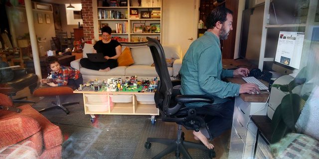 Adults fortunate enough to keep their jobs had to work from home.