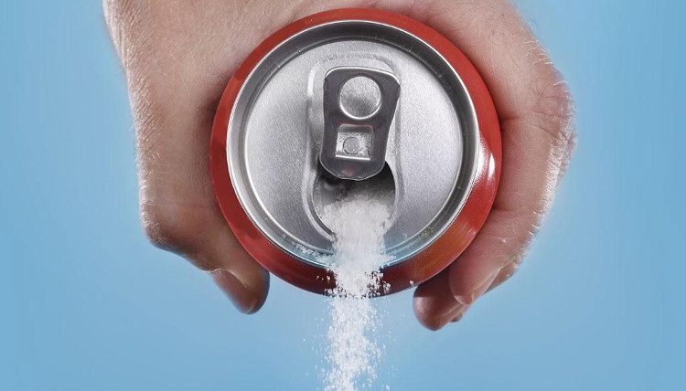 Cans of soft drinks contain a lot of sugar.