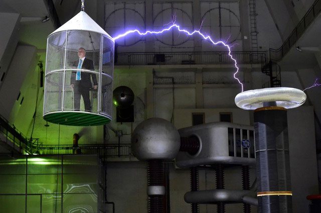 A Faraday cage is a device created from a conductive material that encloses objects