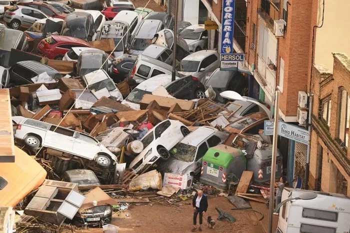 Cars piled up after the flash flood.