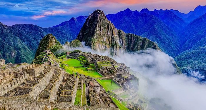 Machu Picchu is an ancient city built between the Andes mountains and the Amazon rainforest